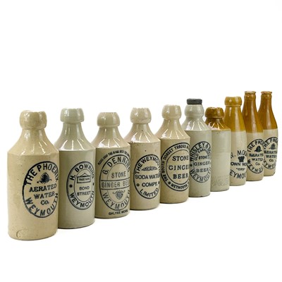 Lot 91 - Ten ginger beer bottles from Dorset; Weymouth, and Dorchester specifically.