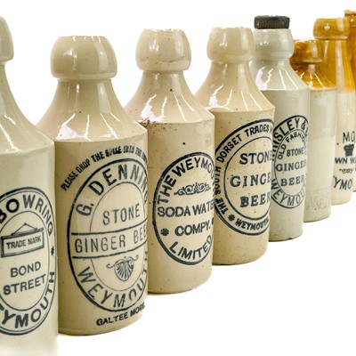 Lot 91 - Ten ginger beer bottles from Dorset; Weymouth, and Dorchester specifically.