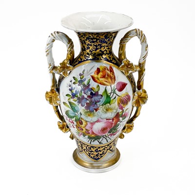 Lot 858 - An English porcelain urn shape vase.