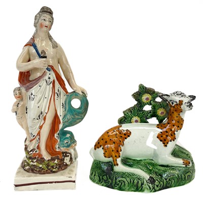 Lot 243 - A Staffordshire pearlware figure of a deer.