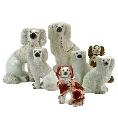 Lot 871 - A pair of small Staffordshire figures of spaniels.