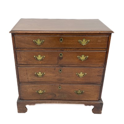 Lot 1884 - A late George III mahogany chest of four long drawers.