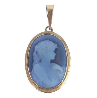 Lot 66 - A modern small Italian 18ct gold mounted blue agate cameo pendant.