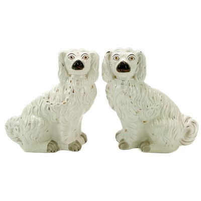 Lot 872 - A pair of Victorian Staffordshire spaniels.