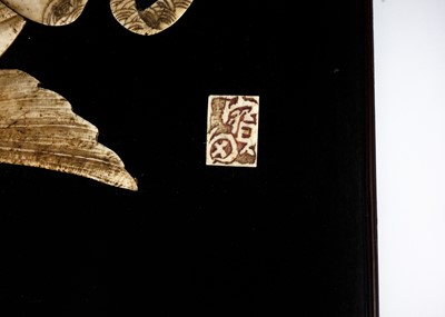 Lot 92 - A pair of Japanese bone decorated ebonised panels, Meiji period.