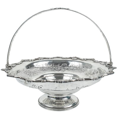 Lot 344 - A George III silver swing handled pedestal cake basket.