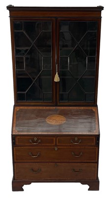 Lot 1872 - A reproduction mahogany bureau bookcase.