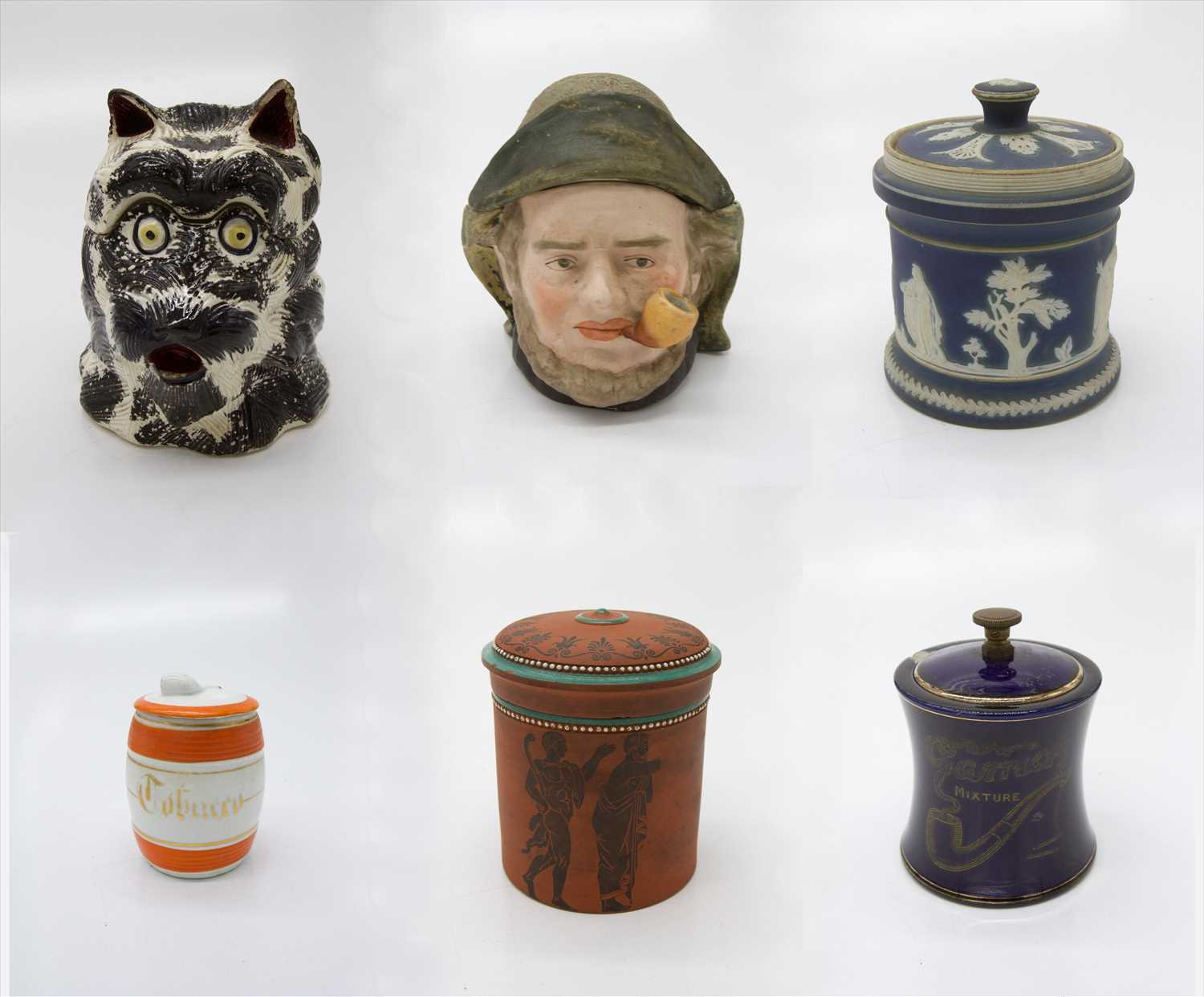 Lot 356 - Six pottery tobacco jars, including one in the...