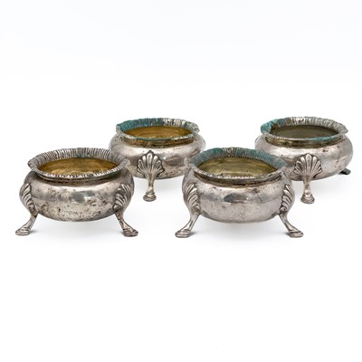 Lot 120 - A Victorian silver set of four circular salts by Daniel & Charles Houle.