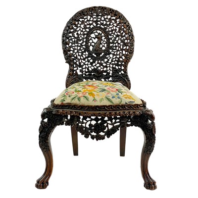 Lot 134 - A Burmese carved hardwood chair, 19th century.