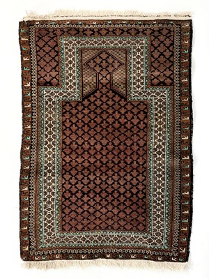 Lot 7 - A Belouch prayer rug, mid 20th century.