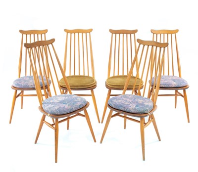 Lot 474 - A set of six Ercol Blonde dining chairs.