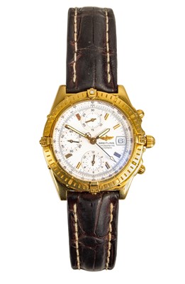 Lot 99 - Breitling - An 18ct Chronomat automatic chronograph gentleman's wristwatch.