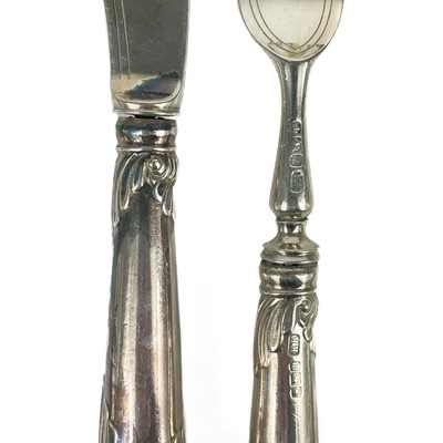 Lot 118 - An incredible Victorian silver pistol grip handled knife and fork set for twenty two.
