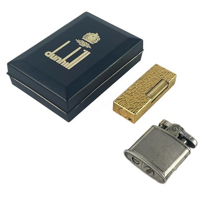 Lot 119 - A Dunhill gold plated lighter.