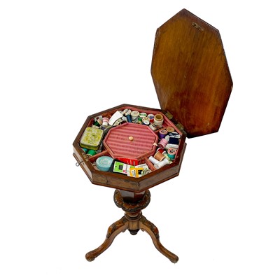 Lot 1837 - A Victorian walnut octagonal sewing table.