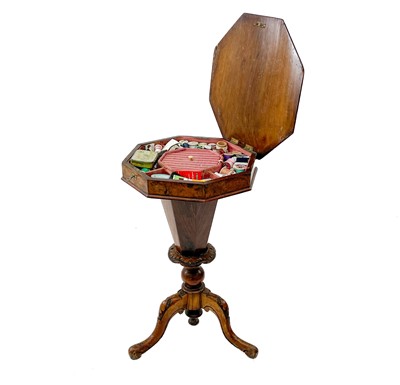 Lot 1837 - A Victorian walnut octagonal sewing table.