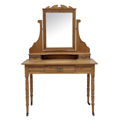 Lot 648 - A late Victorian pine dressing table.