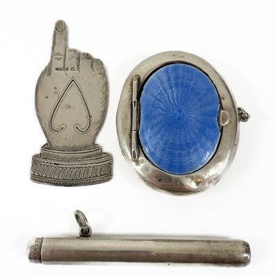 Lot 425 - An Edwardian silver novelty bookmark, a cigar pricker and a silver and enamel compact.