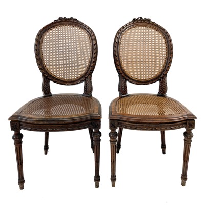 Lot 1943 - A pair of French walnut framed salon chairs.