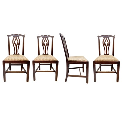 Lot 247 - Four early 19th century fruitwood chairs.