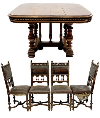 Lot 1857 - A late 19th century walnut dining table and chairs.