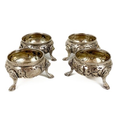 Lot 27 - A Victorian silver set of four circular salts by Henry Holland.