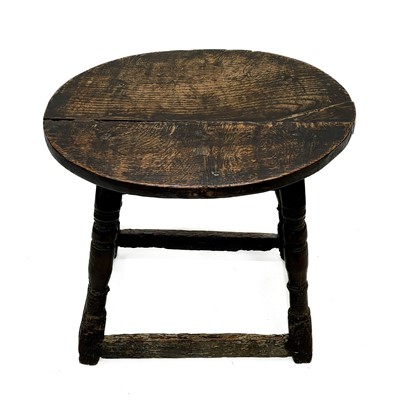 Lot 218 - An oak joint stool.