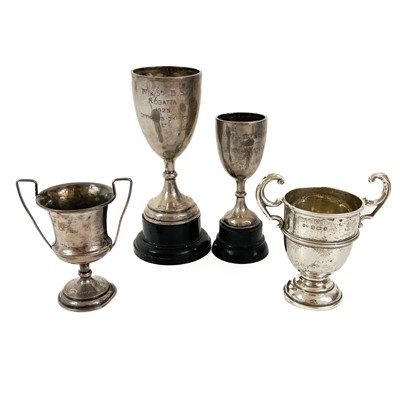 Lot 34 - Four small hallmarked silver trophy cups.