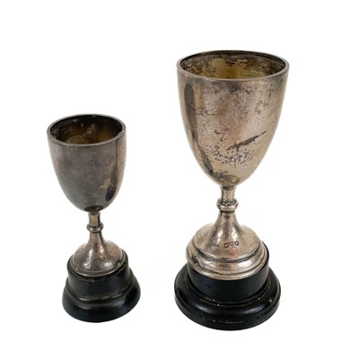 Lot 34 - Four small hallmarked silver trophy cups.