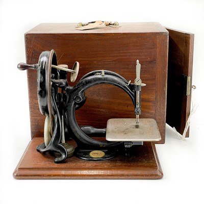 Lot 155 - A Willcox & Gibbs sewing machine.