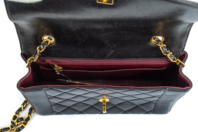 Lot 114 - A Chanel black lambskin leather medium Diana bag.
