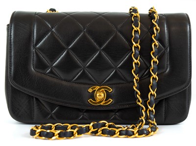 Lot 128 - A Chanel black lambskin leather mini Diana bag.