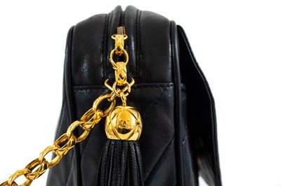 Lot 148 - A Chanel black lambskin leather chevron camera bag.