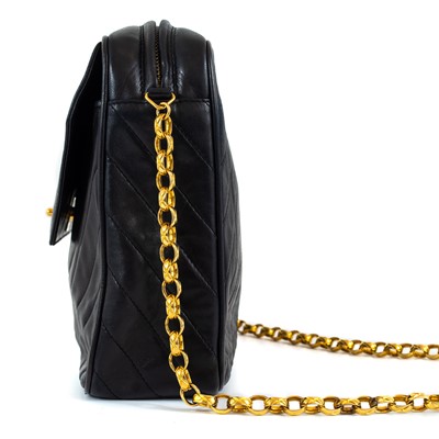 Lot 148 - A Chanel black lambskin leather chevron camera bag.