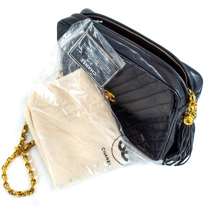 Lot 148 - A Chanel black lambskin leather chevron camera bag.