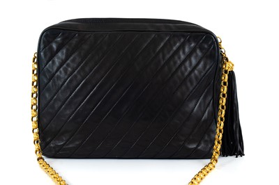Lot 148 - A Chanel black lambskin leather chevron camera bag.