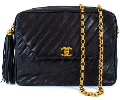 Lot 148 - A Chanel black lambskin leather chevron camera bag.