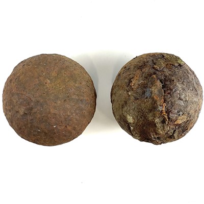 Lot 236 - Two cast iron cannonballs