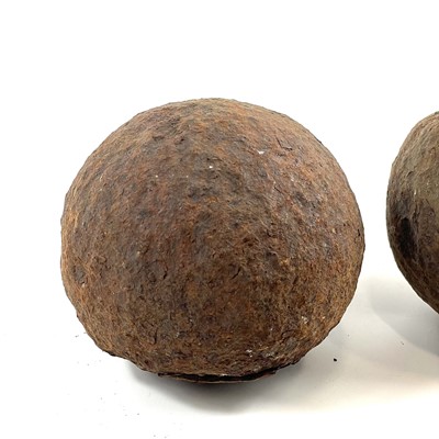 Lot 236 - Two cast iron cannonballs