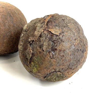 Lot 236 - Two cast iron cannonballs