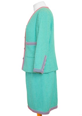 Lot 138 - A Chanel Boutique turquoise Scoubidou 1994 collection dress suit with braided trim.