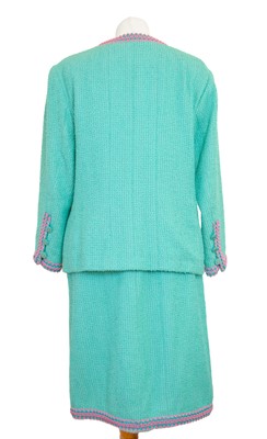 Lot 138 - A Chanel Boutique turquoise Scoubidou 1994 collection dress suit with braided trim.