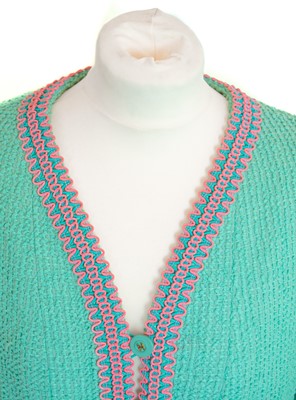 Lot 138 - A Chanel Boutique turquoise Scoubidou 1994 collection dress suit with braided trim.