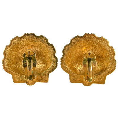 Lot 21 - A Chanel rare pair of 1970's gold-tone scallop shell Maison Gripoix clip earrings.