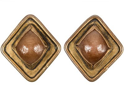 Lot 119 - A Chanel pair of 1960's brown Gripoix clip earrings.