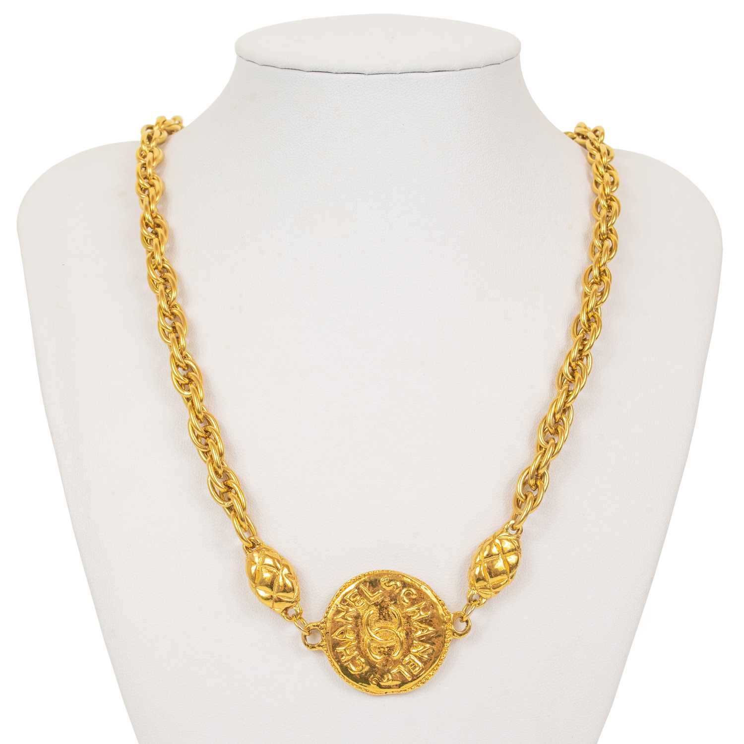 Lot 122 - A Chanel 1970's gold-tone medallion necklace.