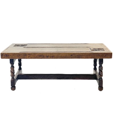 Lot 115 - An oak coffee table, the top constructed from two pew ends.