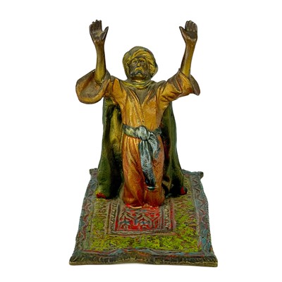 Lot 130 - An Austrian cold painted bronze of an Arab praying.