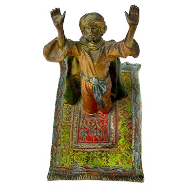 Lot 130 - An Austrian cold painted bronze of an Arab praying.